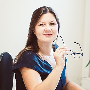 woman holding glasses in her hands
